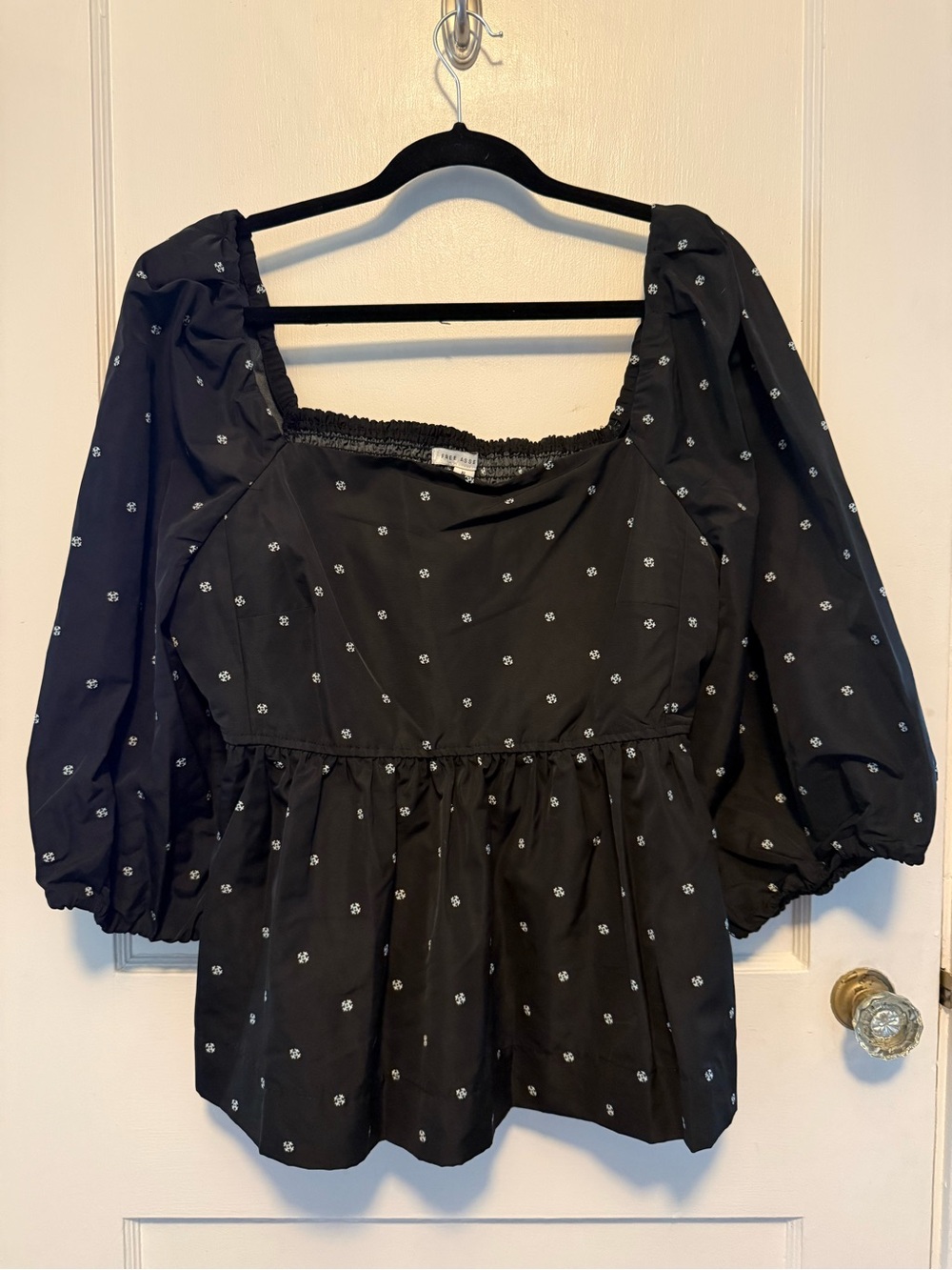 Black Puff-Sleeve Peplum Blouse with Tiny White Floral Print